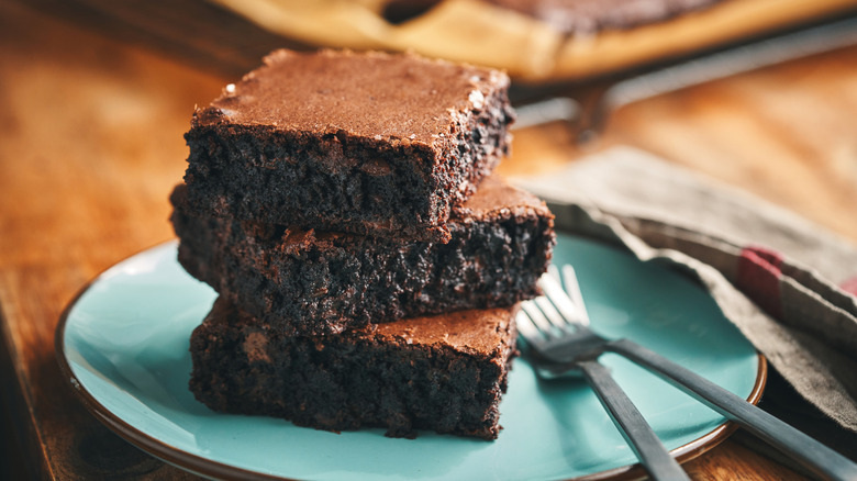 plate of stacked brownies