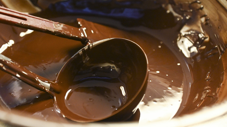 ladle in melted chocolate