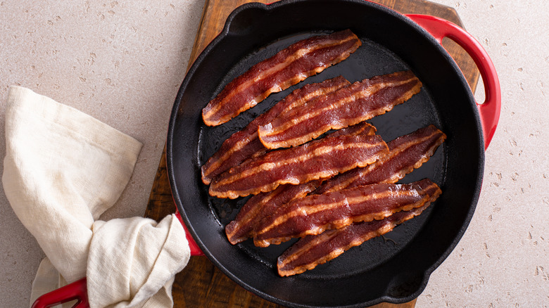 Cooked turkey bacon in a cast iron skillet