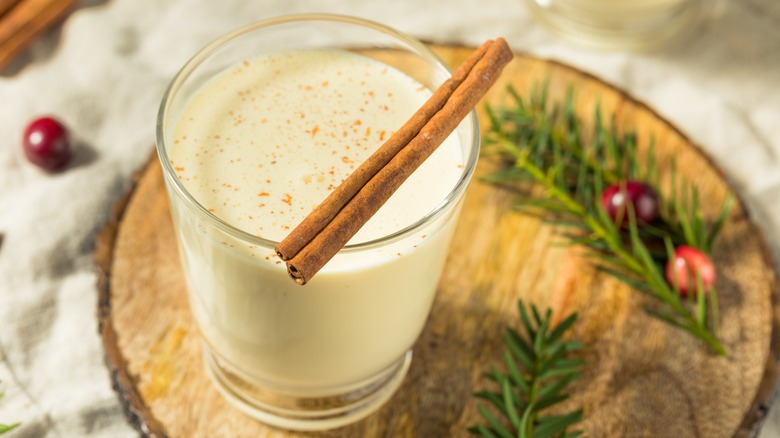 eggnog garnished with cinnamon stick