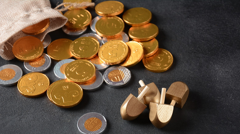 gelt and dreidels on table