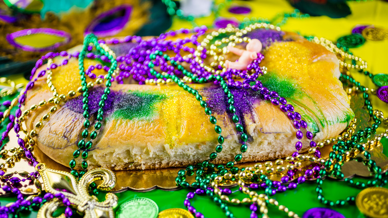 King cake with beads and baby