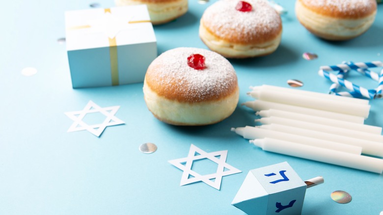 Sufganiyot with star of David and candles