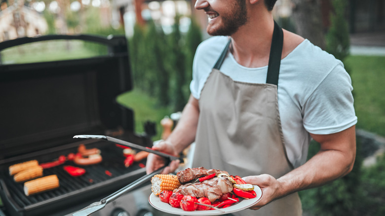 Man grilling food