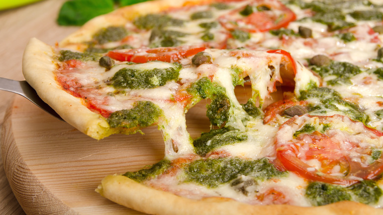 Pizza with pesto and capers