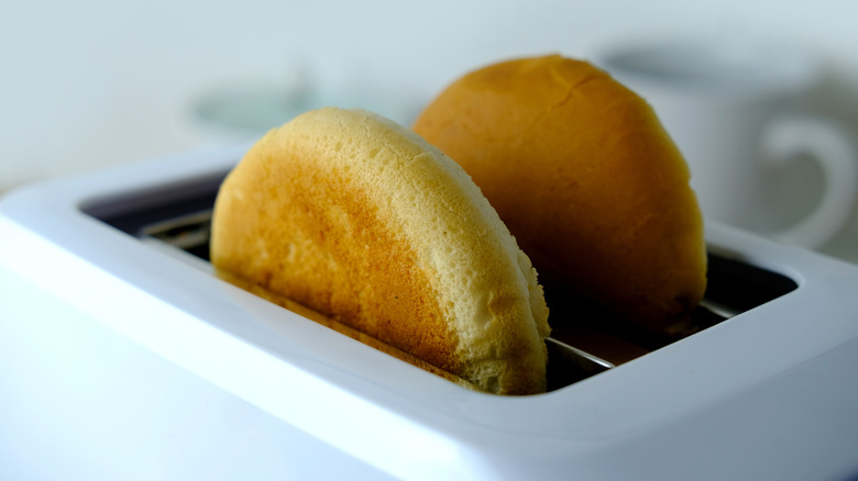 burger buns in white toaster