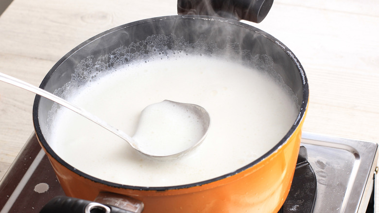 cooking milk pudding on stovetop