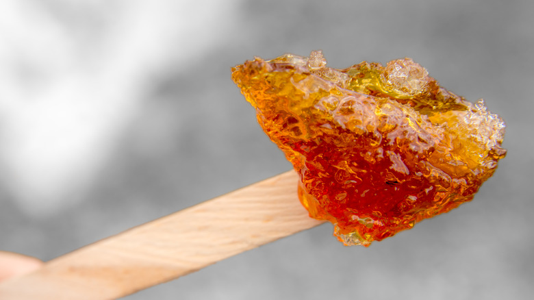 maple taffy on popsicle stik 