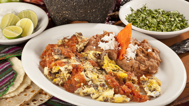 scrambled eggs with refried beans