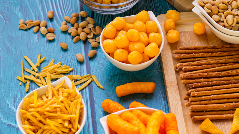 Salty snacks laid on table