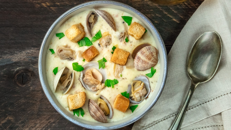 Bowl of clam chowder with spoon