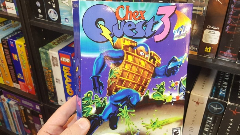 Someone holding a copy of Chex Quest 3