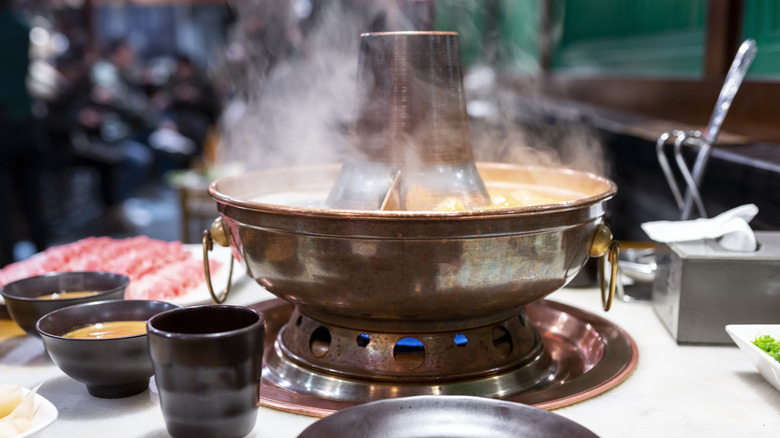 Steaming Sichuan hotpot with ingredients