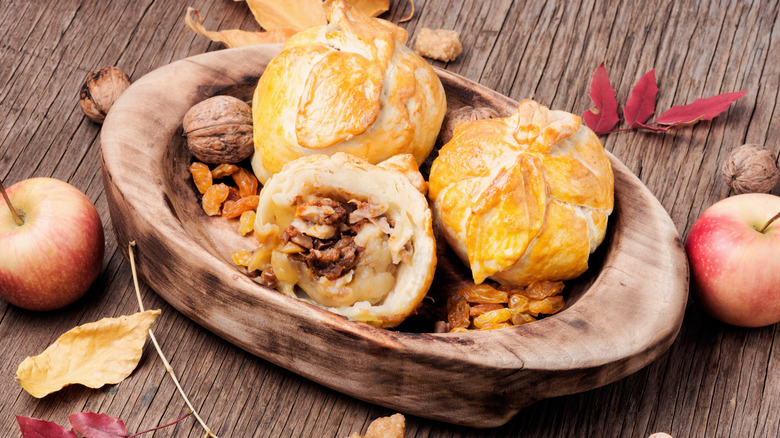 Apple dumplings in wooden bowl