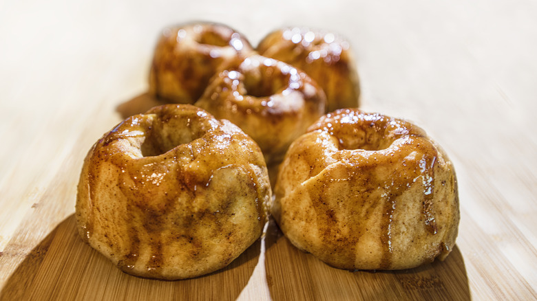 Apple dumplings on wooden table