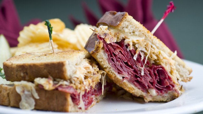 Two halves of reuben sandwich