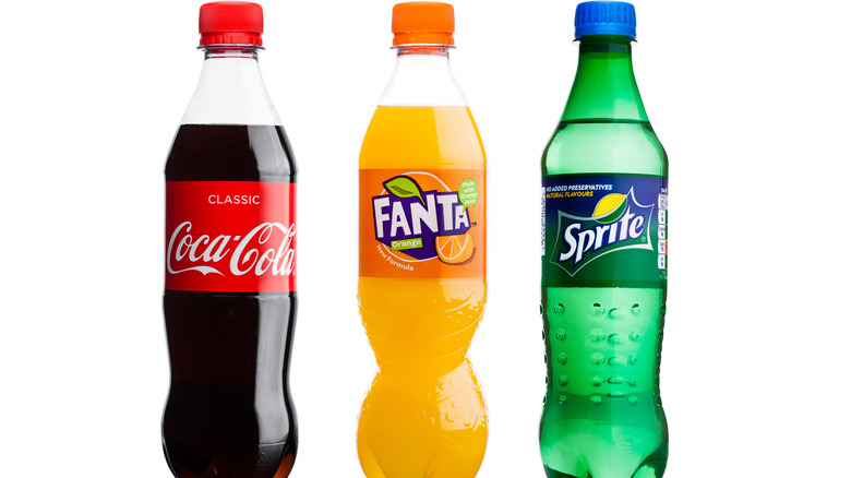 Coca-Cola, Fanta, and Sprite bottles