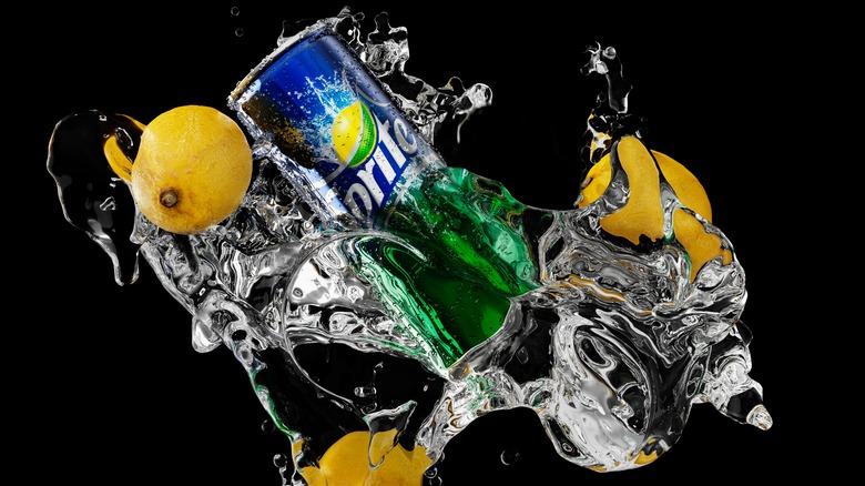 Sprite can with lemons splashing