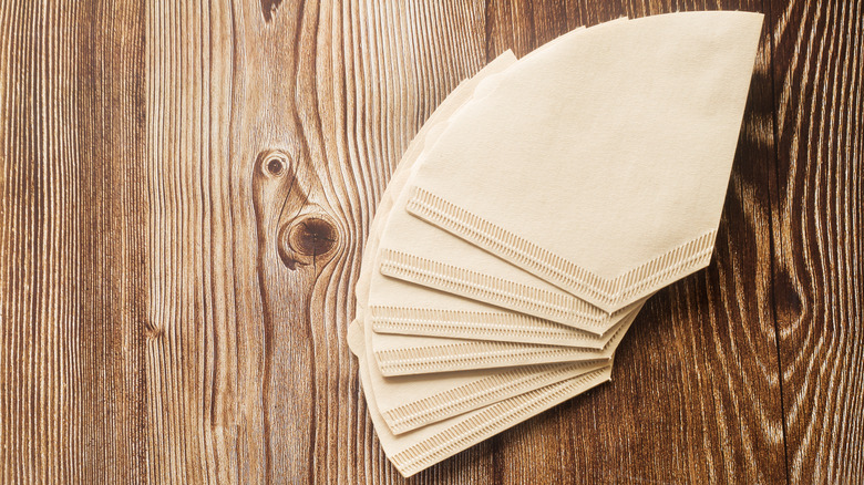 coffee filters on wood table