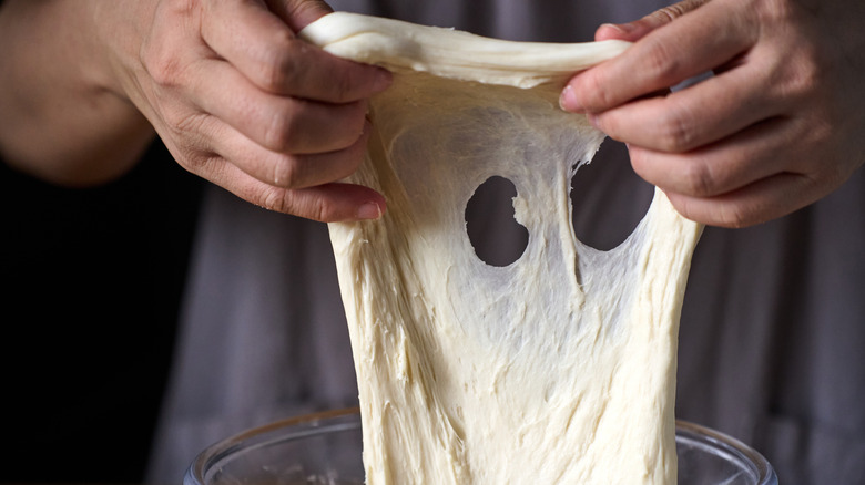 Bread dough tearing when being pulled on