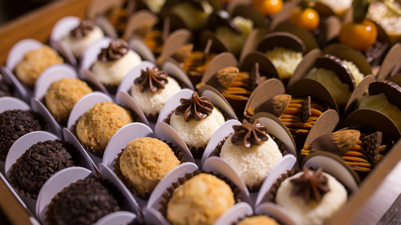 an assortment of gourmet chocolate in a box