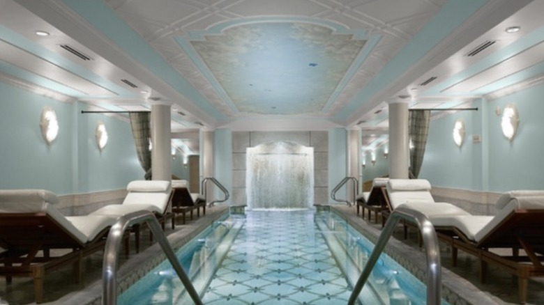 Destination Kohler pool leads into waterfall surrounded by luxury fixtures