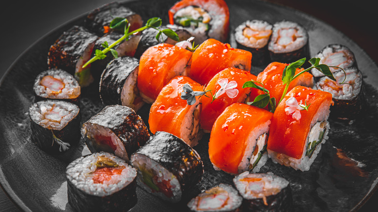 https://www.thedailymeal.com/img/gallery/the-complete-list-of-sushi-rolls-ranked/intro-1666963587.jpg