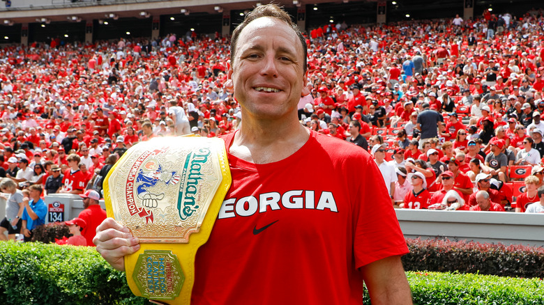 Joey Chestnut with Nathan's belt