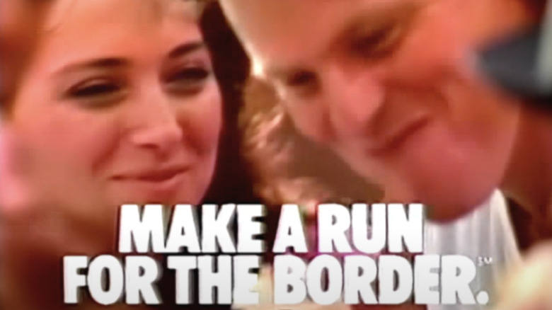 Two smiling people above text reading "Make a Run For the Border."
