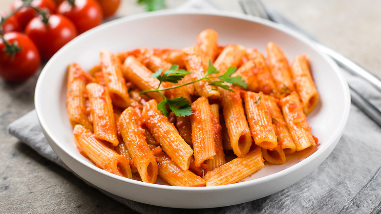 Penne pasta with tomato sauce in a bowl