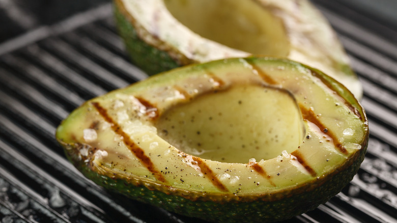 Avocado halves with grill marks