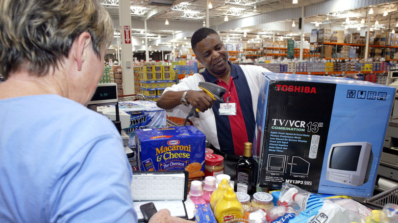 Costco cashier checking out customer