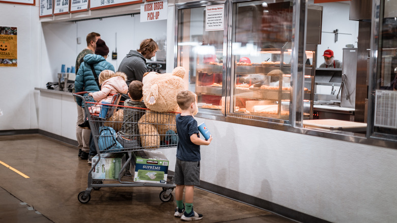 Costco customers waiting at food court