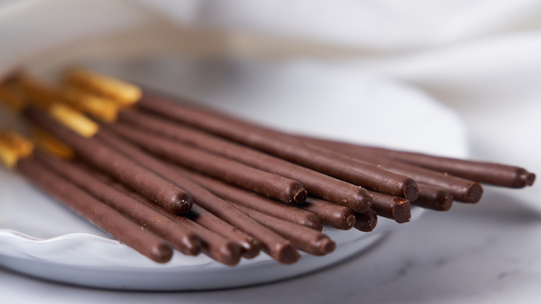 Close up of chocolate Pocky sticks on a plate