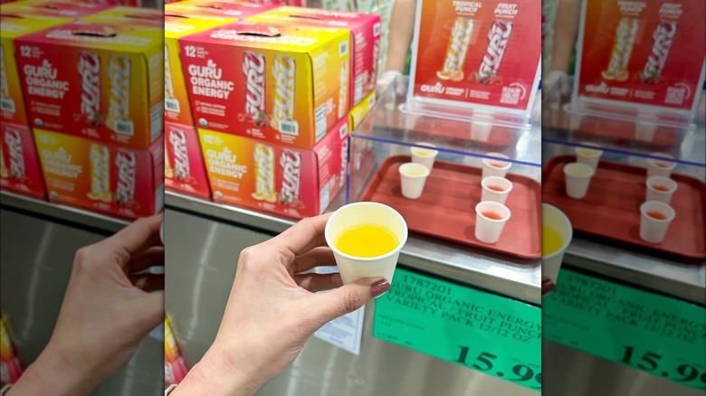 Person holding Costco sample cup