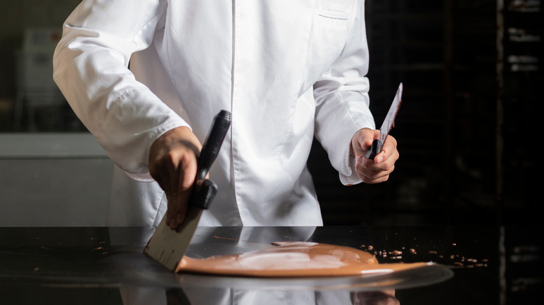 Chef tempering chocolate