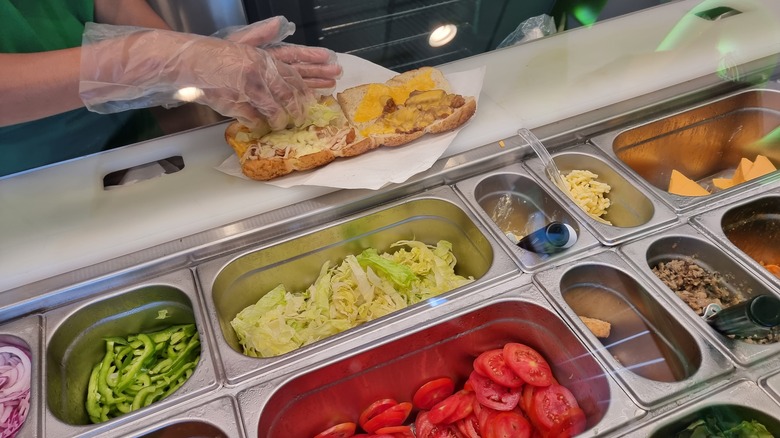 Subway worker making a sandwich