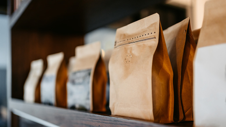 Bags of coffee on shelf