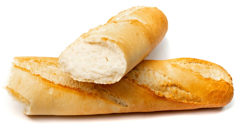 French baguette torn in half