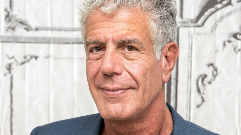 Anthony Bourdain with wry smile