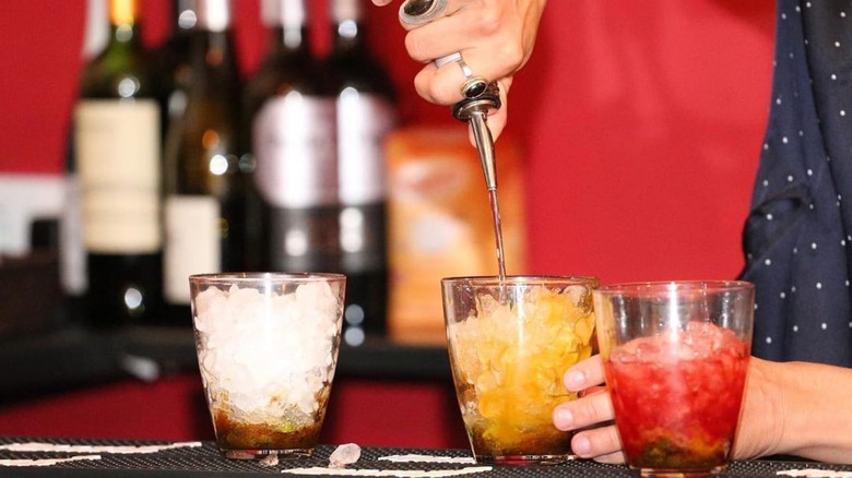 Bartender pouring drinks