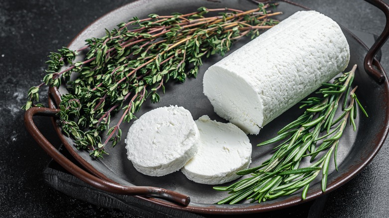 sliced chèvre cheese on plate