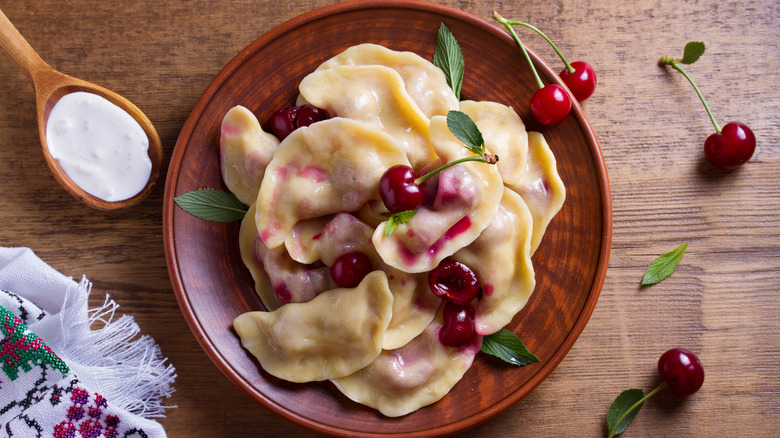 Cherry-filled pierogi on a plate