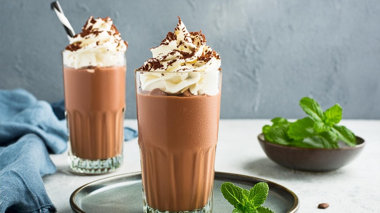 Chocolate milkshakes with whipped cream