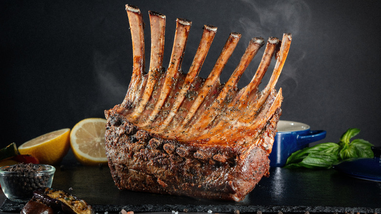 Cooked rack of lamb with lemon and basil