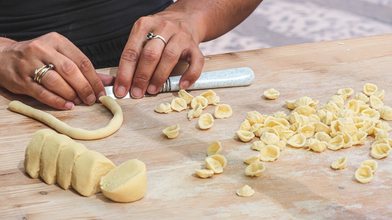 Person making homemade pasta