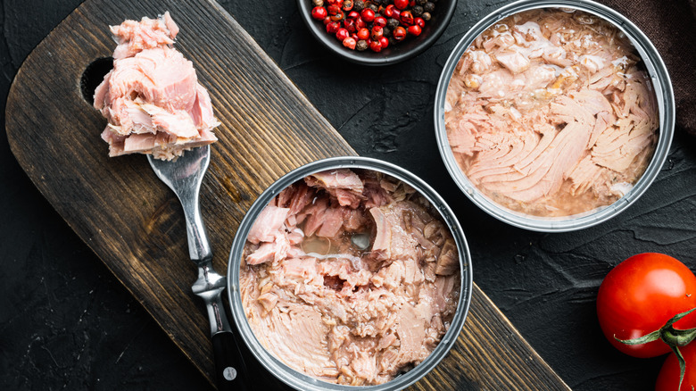 Light canned tuna on a wooden board