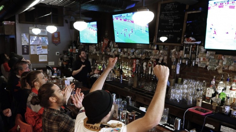 England bar patrons watch soccer