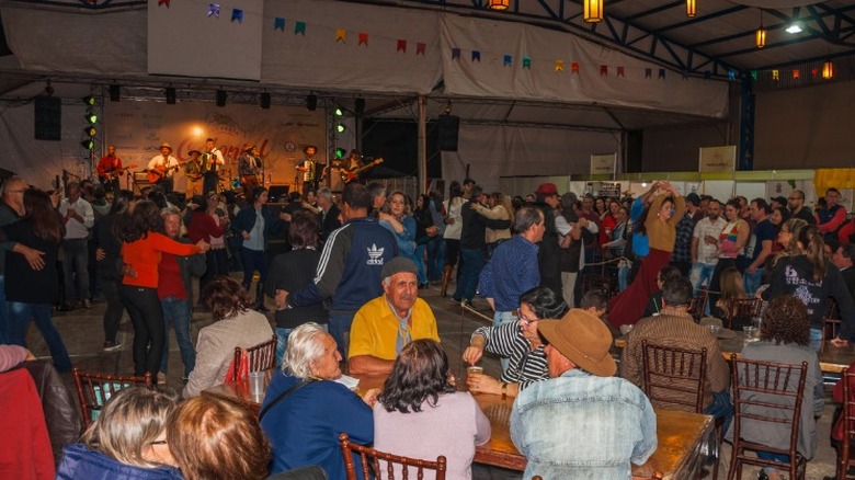 People dancing in music venue