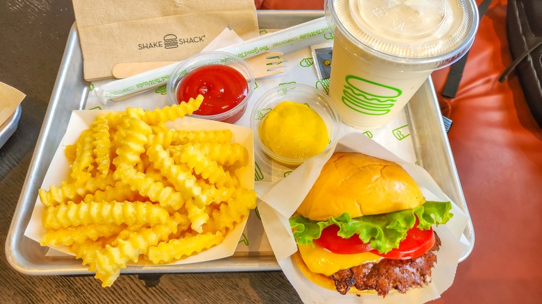 Shake Shack fries, burger, and shake on tray